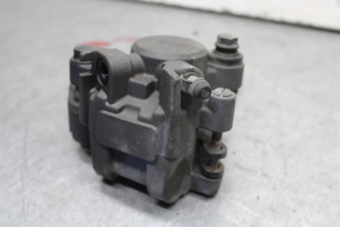 09-11 TRIUMPH DAYTONA 675 REAR BACK BRAKE CALIPER W MOUNT BRACKET BB652