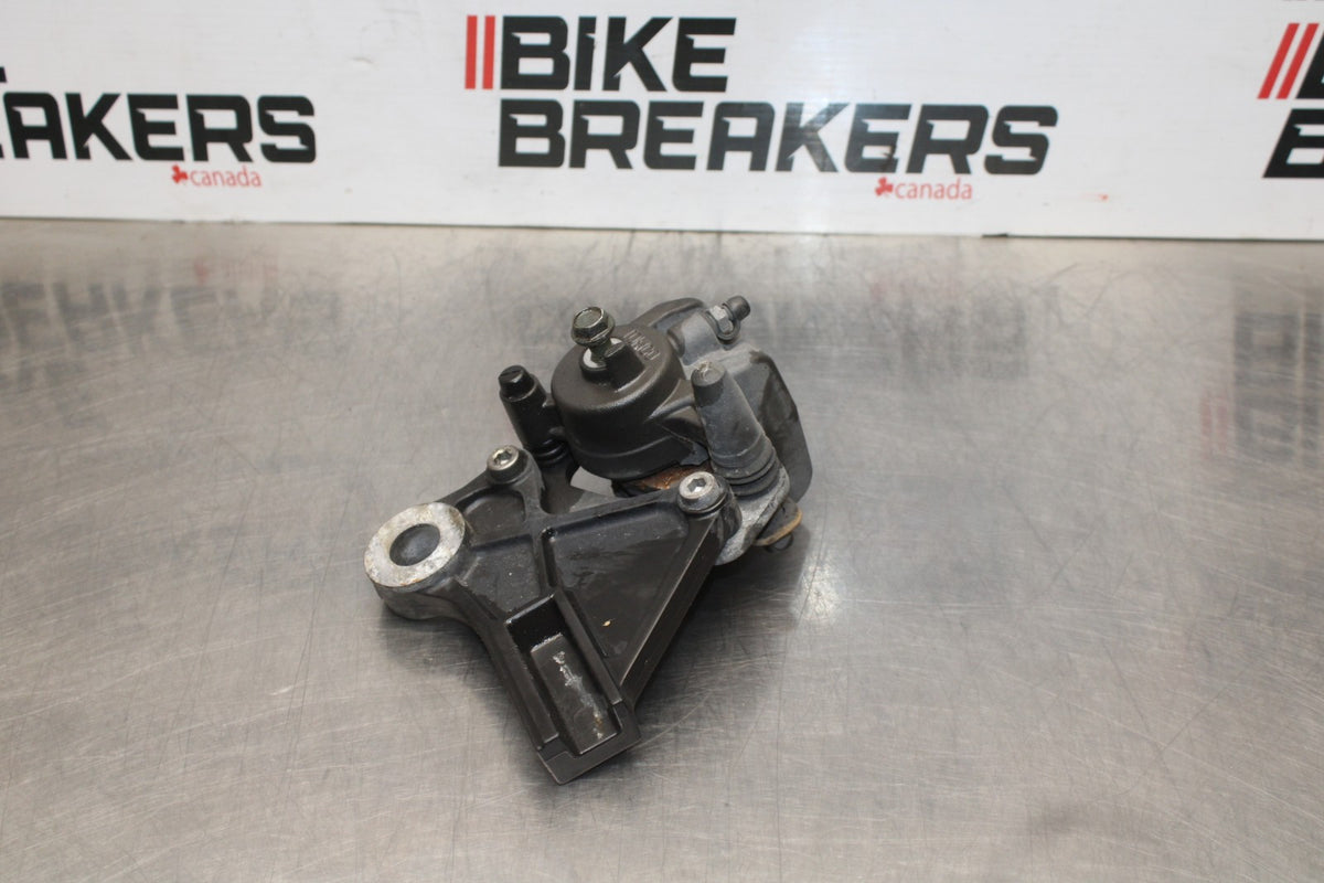 06-07 KAWASAKI NINJA 650R EX650A REAR BACK BRAKE CALIPER W MOUNT BRACKET BB774
