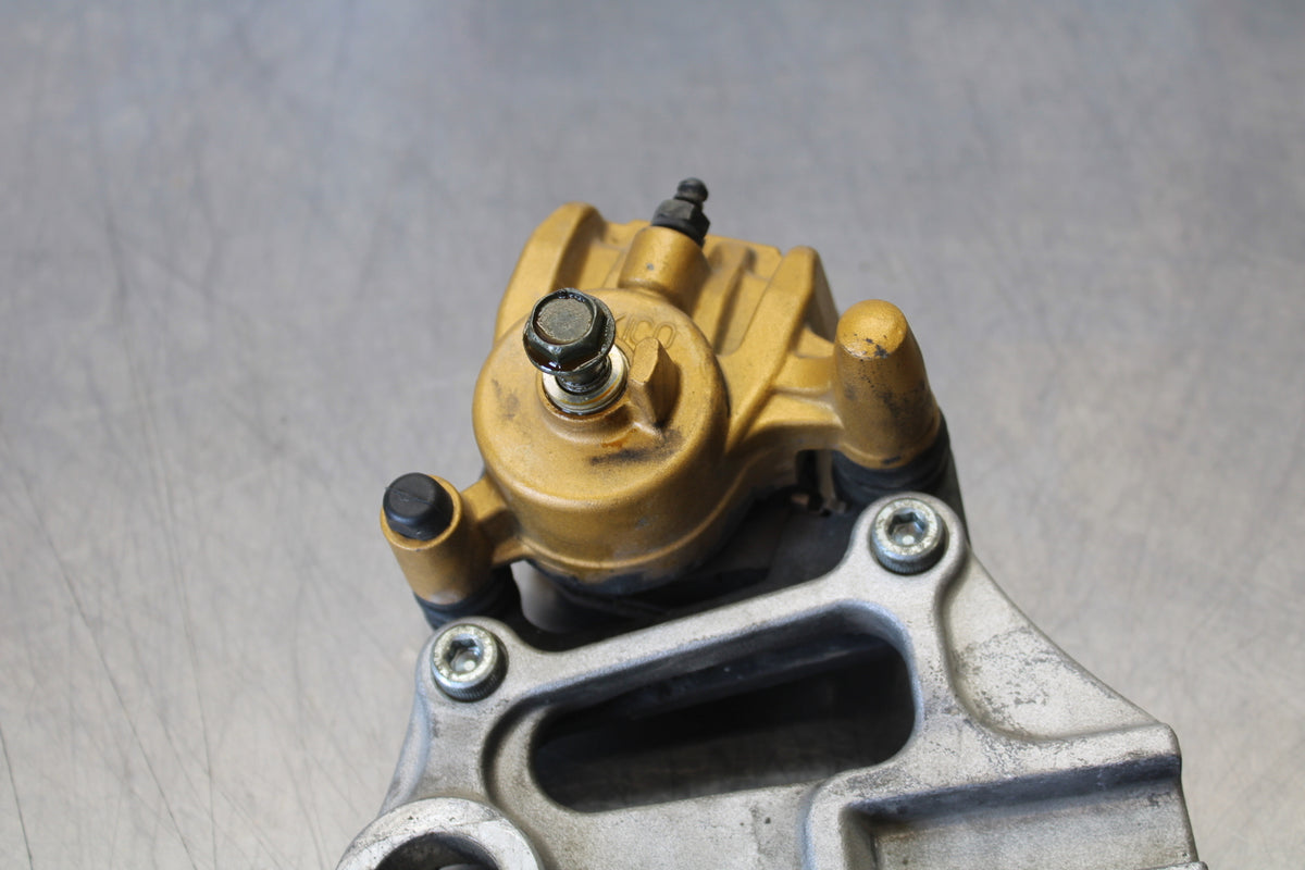 03-06 KAWASAKI Z1000 REAR BACK BRAKE CALIPER W MOUNT BRACKET BB164