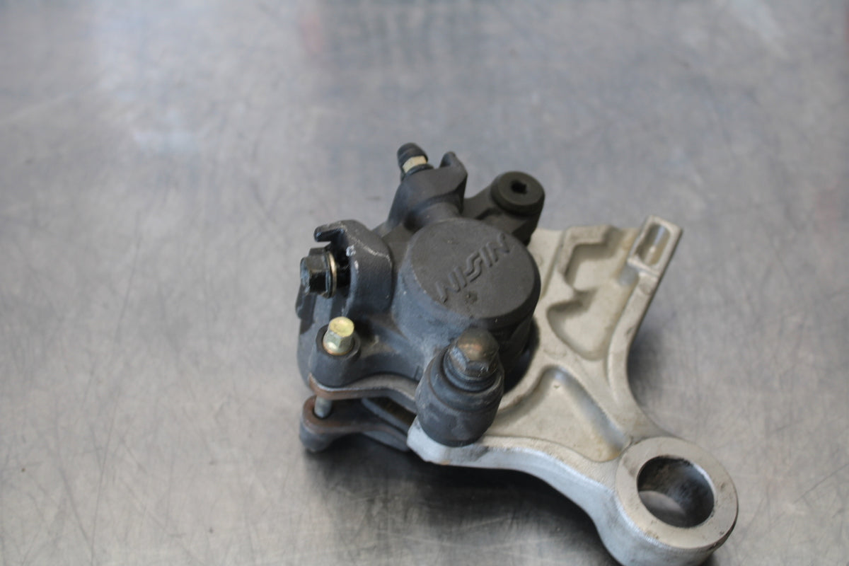 05-06 HONDA CBR600RR REAR BACK BRAKE CALIPER W MOUNT BRACKET BB159