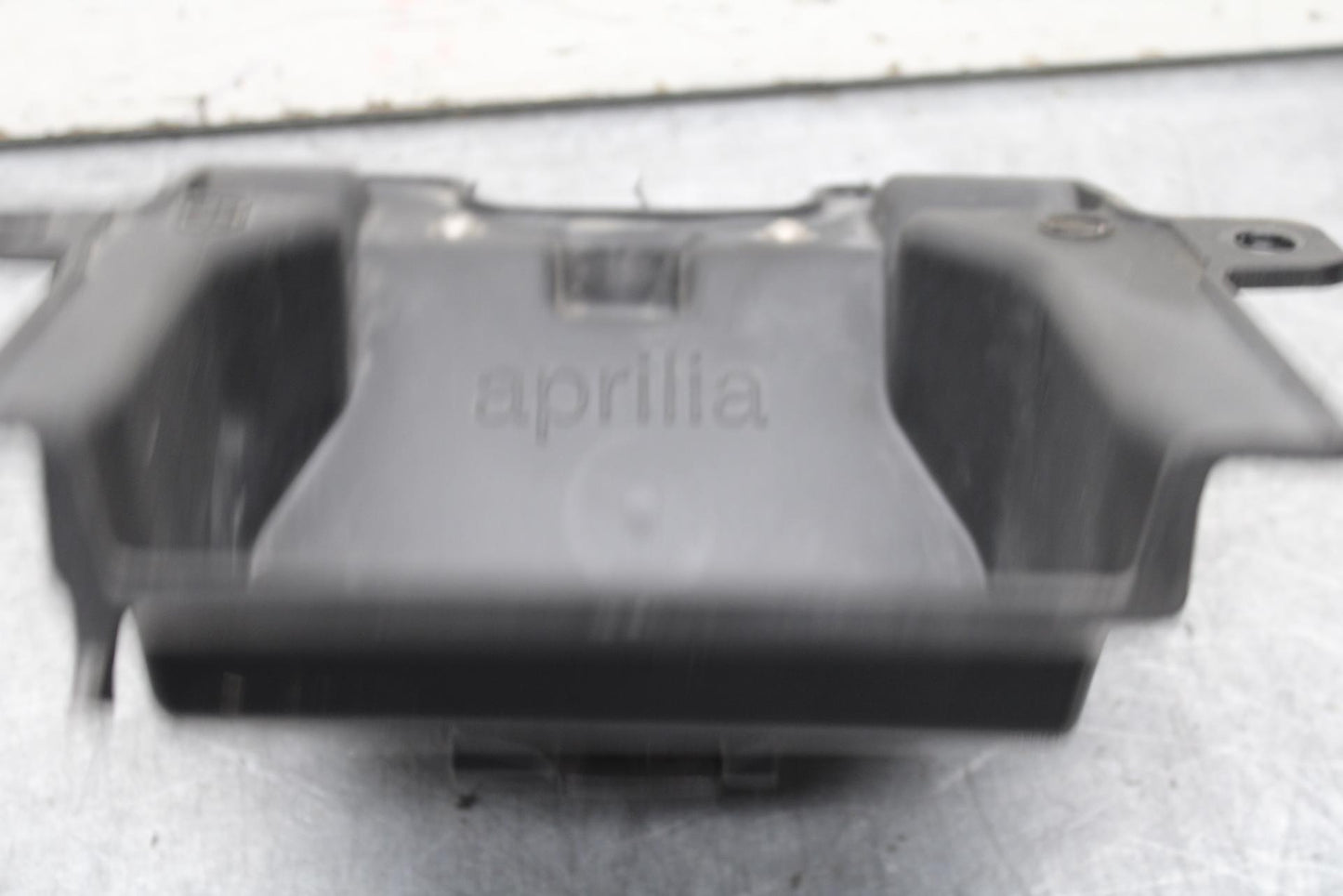 20-23 APRILIA RS660 RBATTERY TRAY PLASTIC BB643