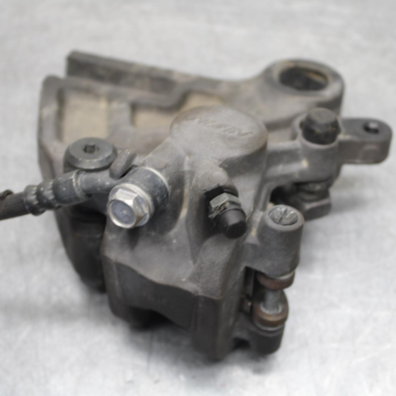 21 KAWASAKI NINJA ZX6R REAR BACK BRAKE CALIPER W MOUNT BRACKET  BB647