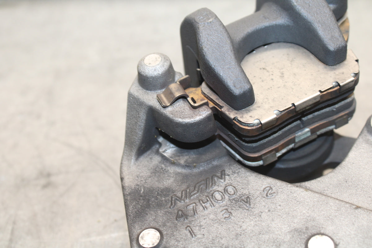 13 SUZUKI GSXR750 REAR BACK BRAKE CALIPER W MOUNT BRACKET BB110