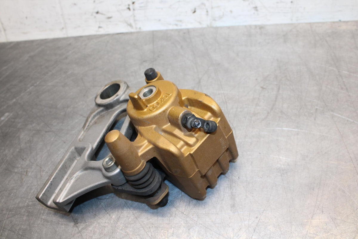 03-06 KAWASAKI Z1000 REAR BACK BRAKE CALIPER W MOUNT BRACKET BB487