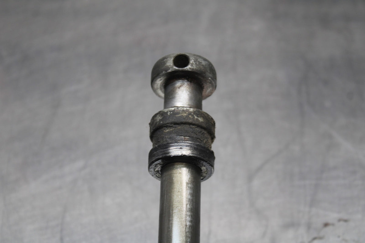 77 SUZUKI GS750 REAR AXLE BACK WHEEL RIM PIVOT BOLT AXEL 64711-37000 BB779