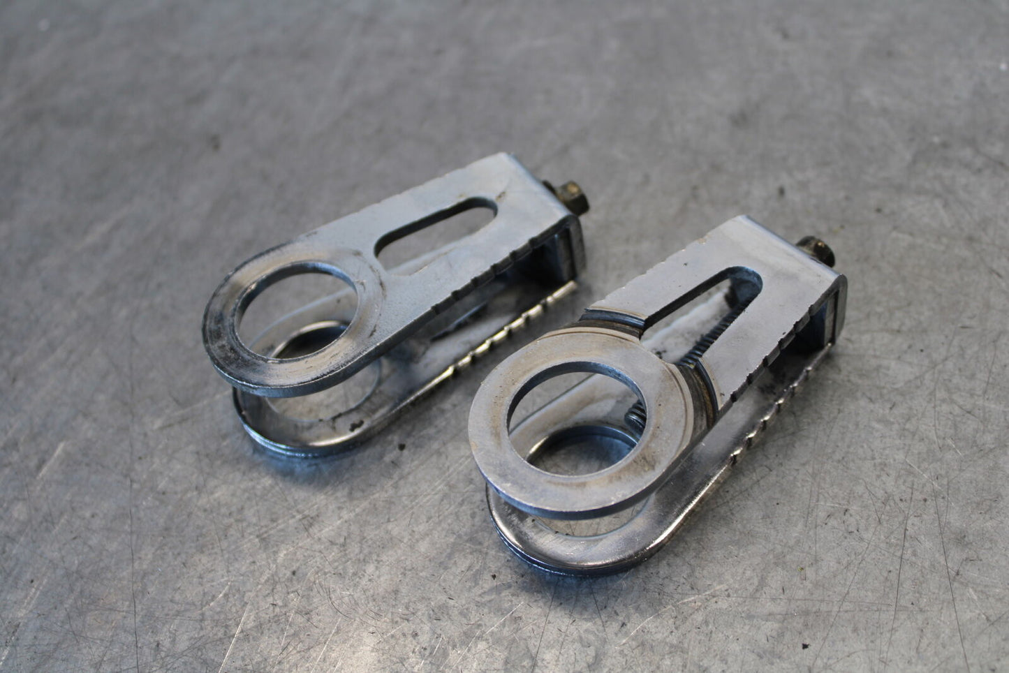 03-04 HONDA CBR600RR SWINGARM CHAIN TENSIONER ADJUSTMENT BRACKETS BB661