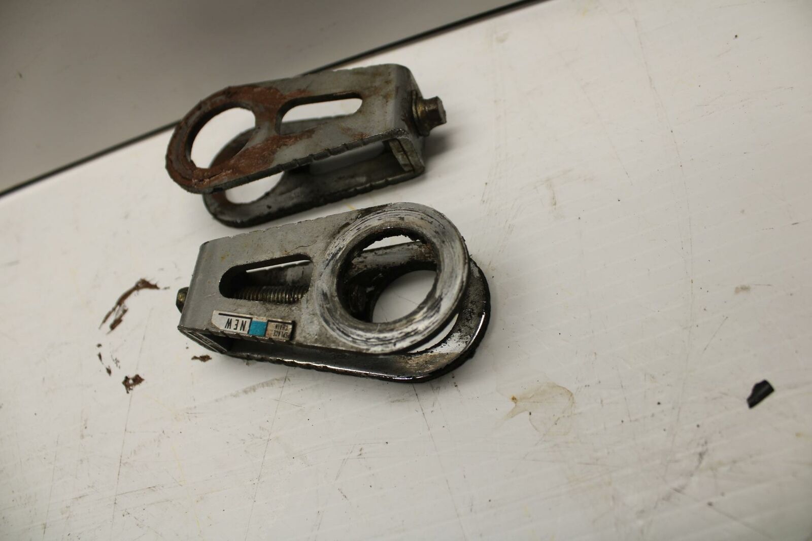 03-04 HONDA CBR600RR SWINGARM CHAIN TENSIONER ADJUSTMENT BRACKETS  BB253