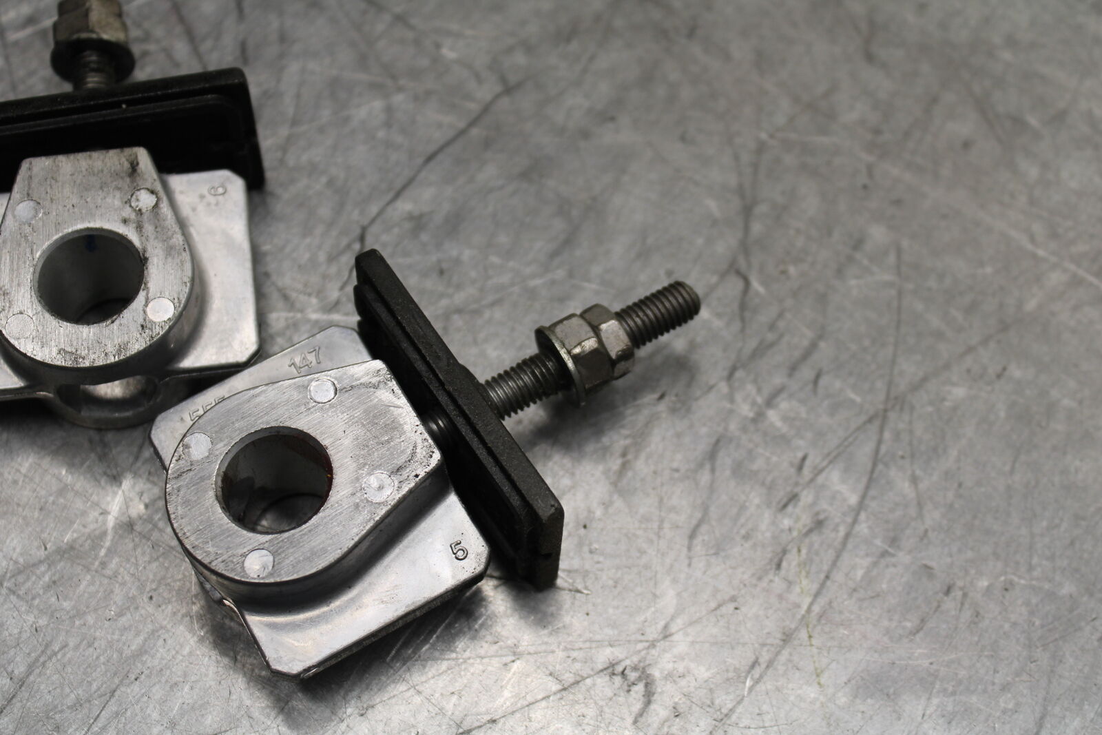 19-22 KAWASAKI Z400 SWINGARM CHAIN TENSIONER ADJUSTMENT BRACKETS  BB738