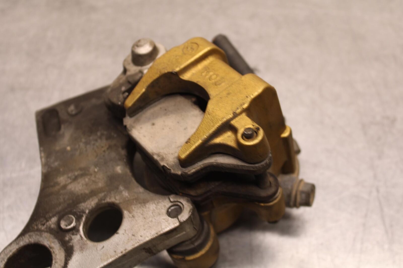 03-04 HONDA CBR600RR REAR BACK BRAKE CALIPER W MOUNT BRACKET  BB628