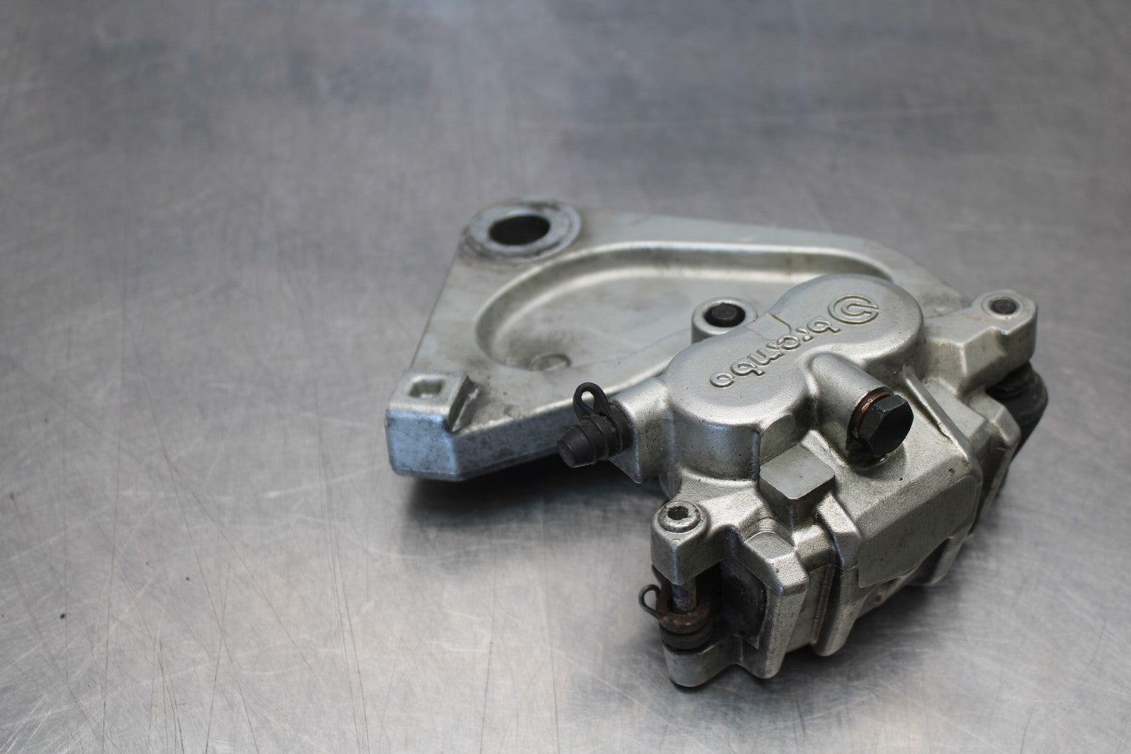 05-06 VICTORY KINGPIN DELUXE REAR BACK BRAKE CALIPER W MOUNT BRACKET BB195