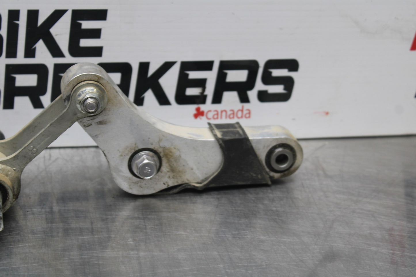 22-25 YAMAHA YZF R7 REAR DOGBONE SHOCK LINKAGE LINK 1WS-2217A-00-00 BB769