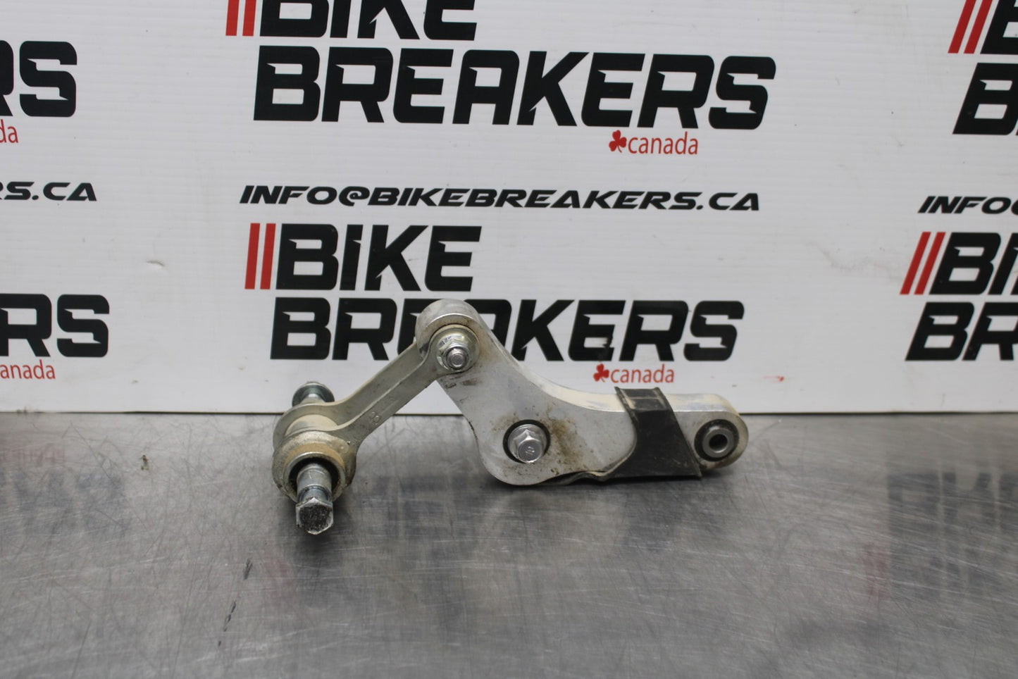 22-25 YAMAHA YZF R7 REAR DOGBONE SHOCK LINKAGE LINK 1WS-2217A-00-00 BB769