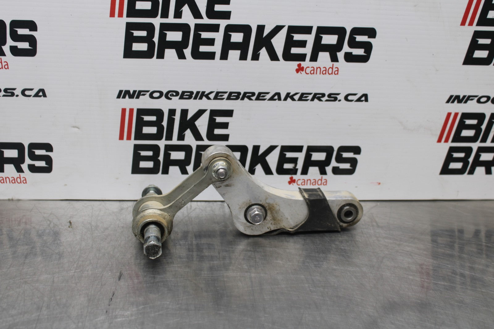 22-25 YAMAHA YZF R7 REAR DOGBONE SHOCK LINKAGE LINK 1WS-2217A-00-00 BB769