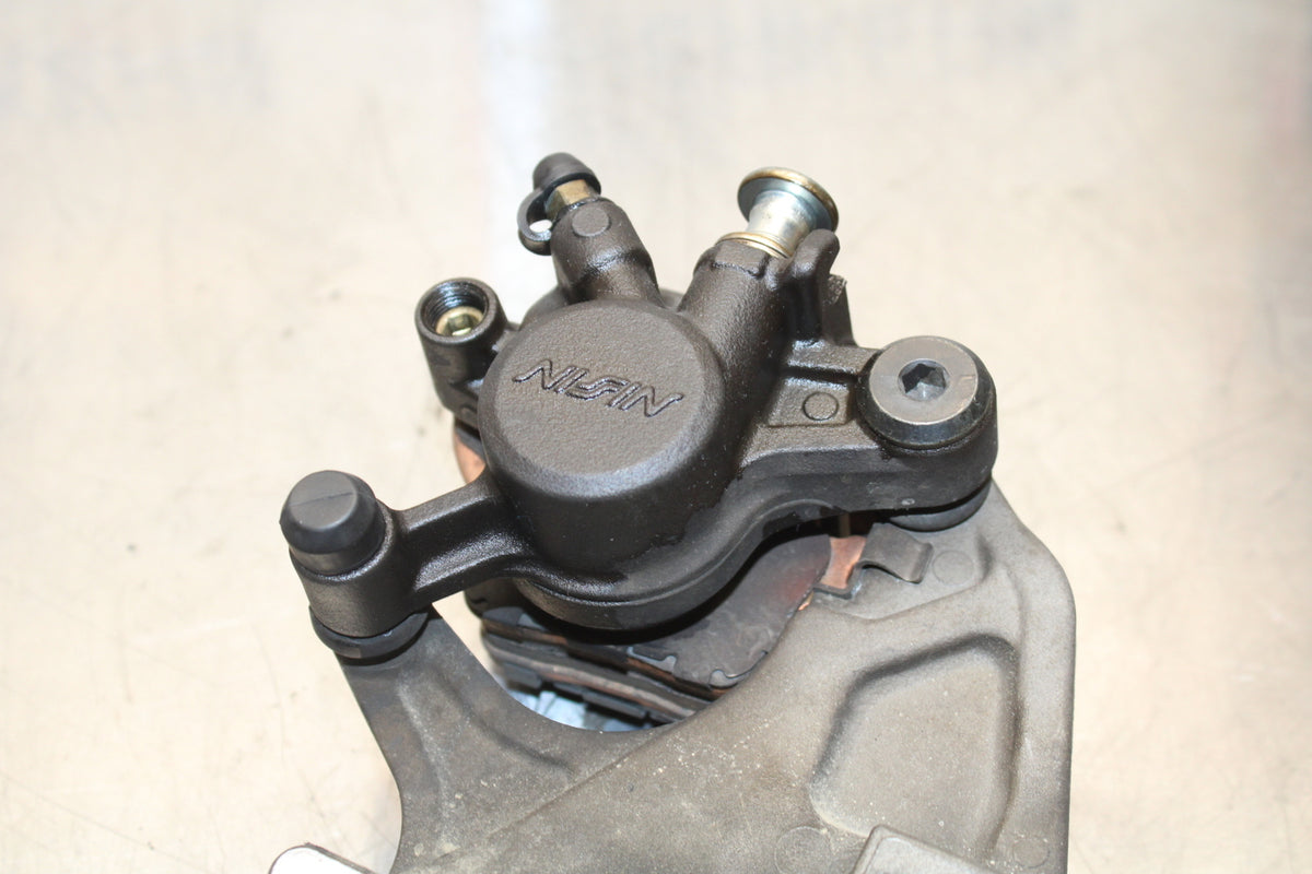 11 SUZUKI GSXR1000 REAR BACK BRAKE CALIPER W MOUNT BRACKET BB142 