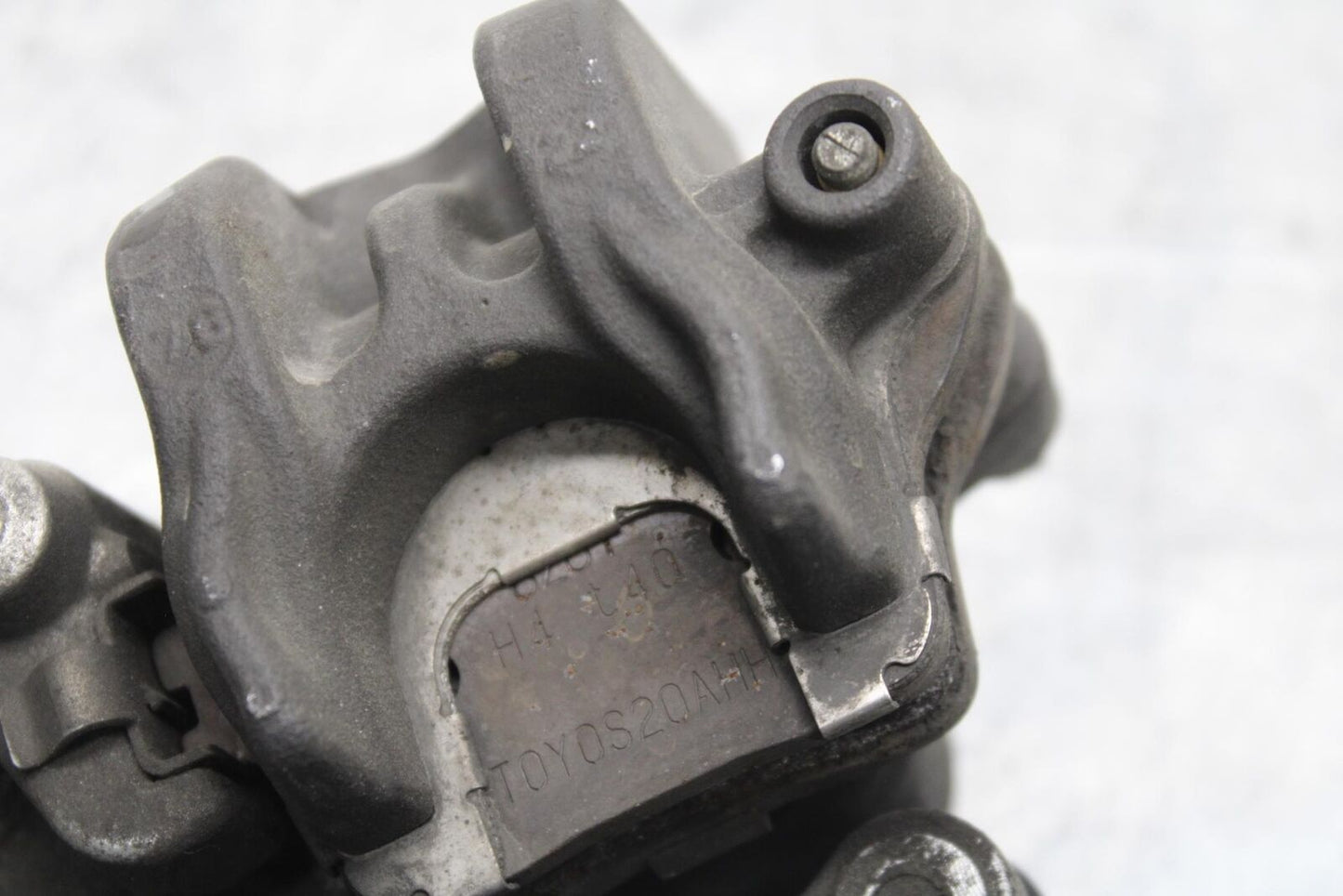 2007 Honda CBR600RR REAR BRAKE CALIPER W MOUNT BRACKET 43150-MFJ-D01 BB596