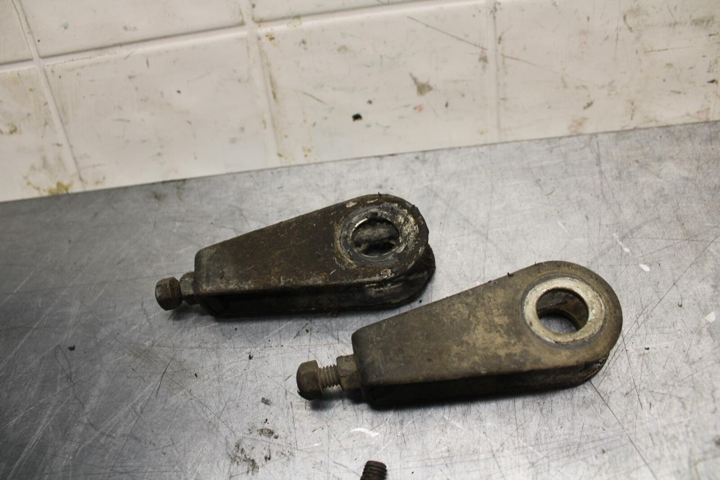 75 SUZUKI GT 550 SWINGARM CHAIN TENSIONER ADJUSTMENT BRACKETS  BB72