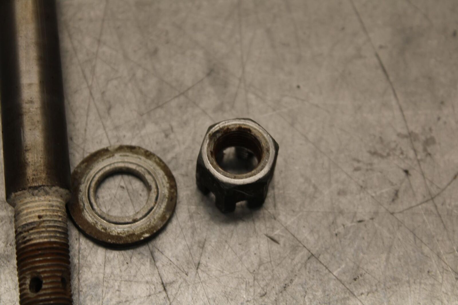 75 SUZUKI GT 550 FRONT WHEEL RIM AXLE PIVOT BOLT BB67