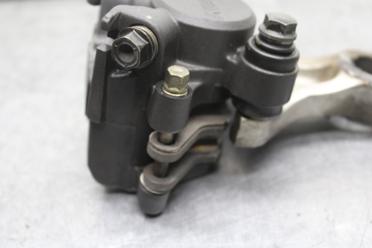 05-06 HONDA CBR600RR REAR BACK BRAKE CALIPER W MOUNT BRACKET BB727