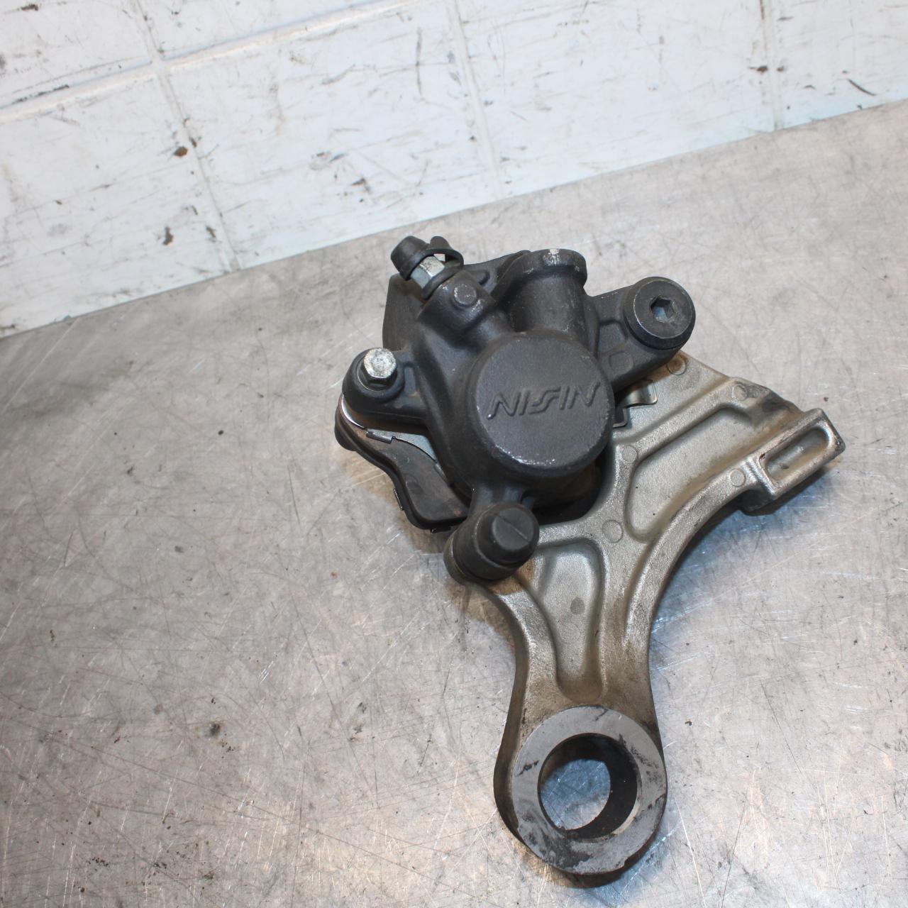2007 Honda CBR600RR REAR BACK BRAKE CALIPER W MOUNT BRACKET 43150-MFJ-D01 BB42