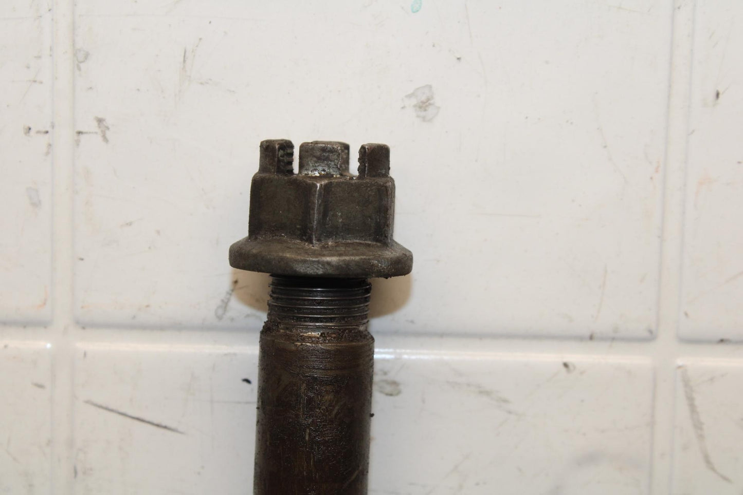 1977 Honda CB550K --- REAR AXLE BACK WHEEL PIVOT BOLT AXEL 42301-300-020 BB592