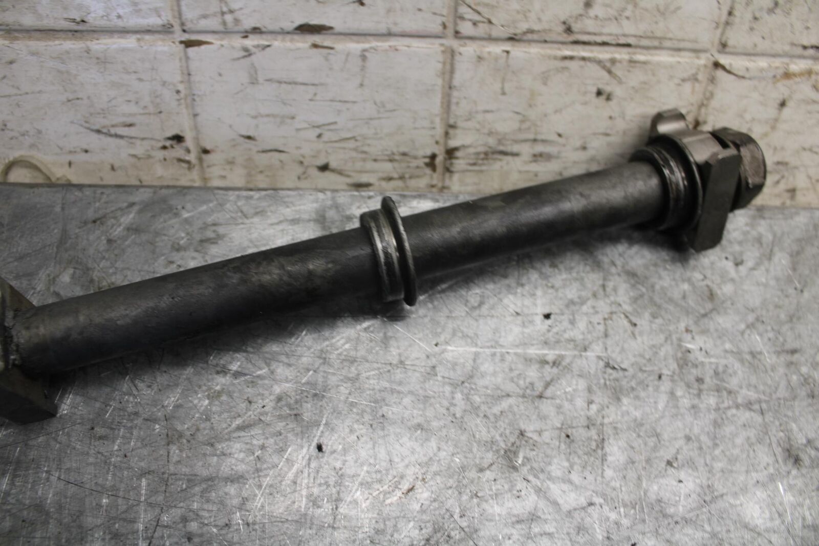 2007 Honda CBR600RR REAR AXLE BACK WHEEL RIM PIVOT BOLT AXEL 42301-MEE-D00 BB542