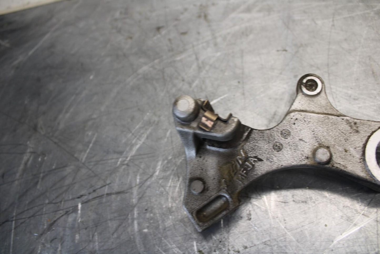 2011 Honda CBR600RR REAR BRAKE CALIPER HANGER BACK MOUNTING BRACKET BB520