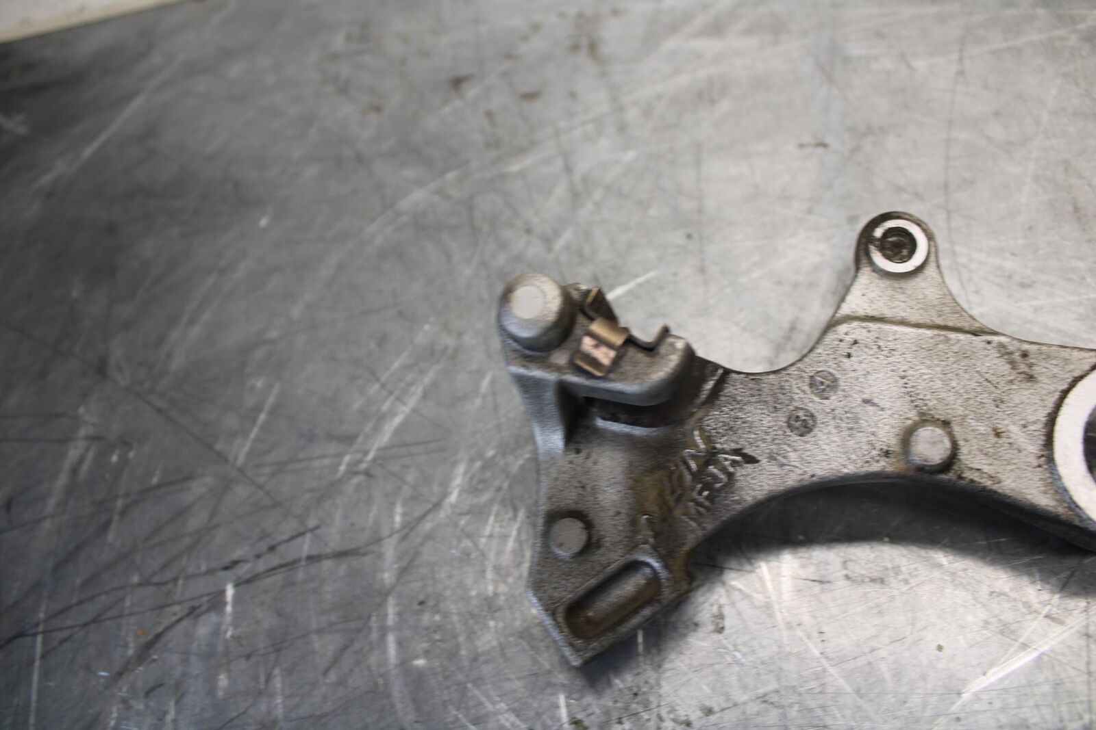 2011 Honda CBR600RR REAR BRAKE CALIPER HANGER BACK MOUNTING BRACKET BB520