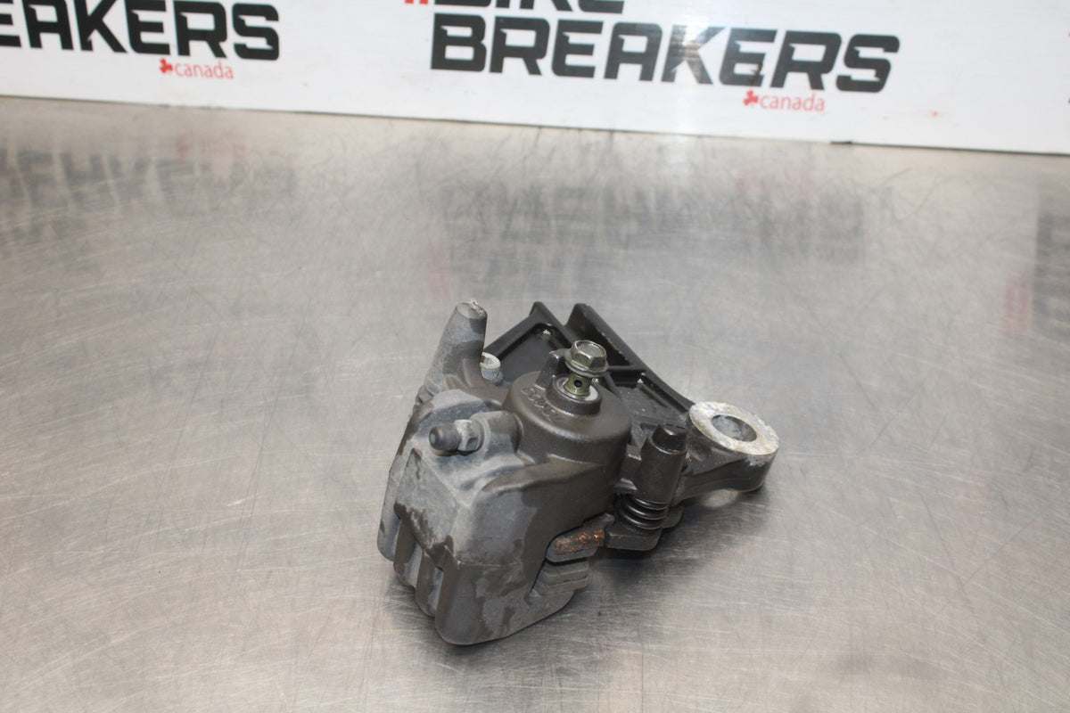 06-07 KAWASAKI NINJA 650R EX650A REAR BACK BRAKE CALIPER W MOUNT BRACKET BB774