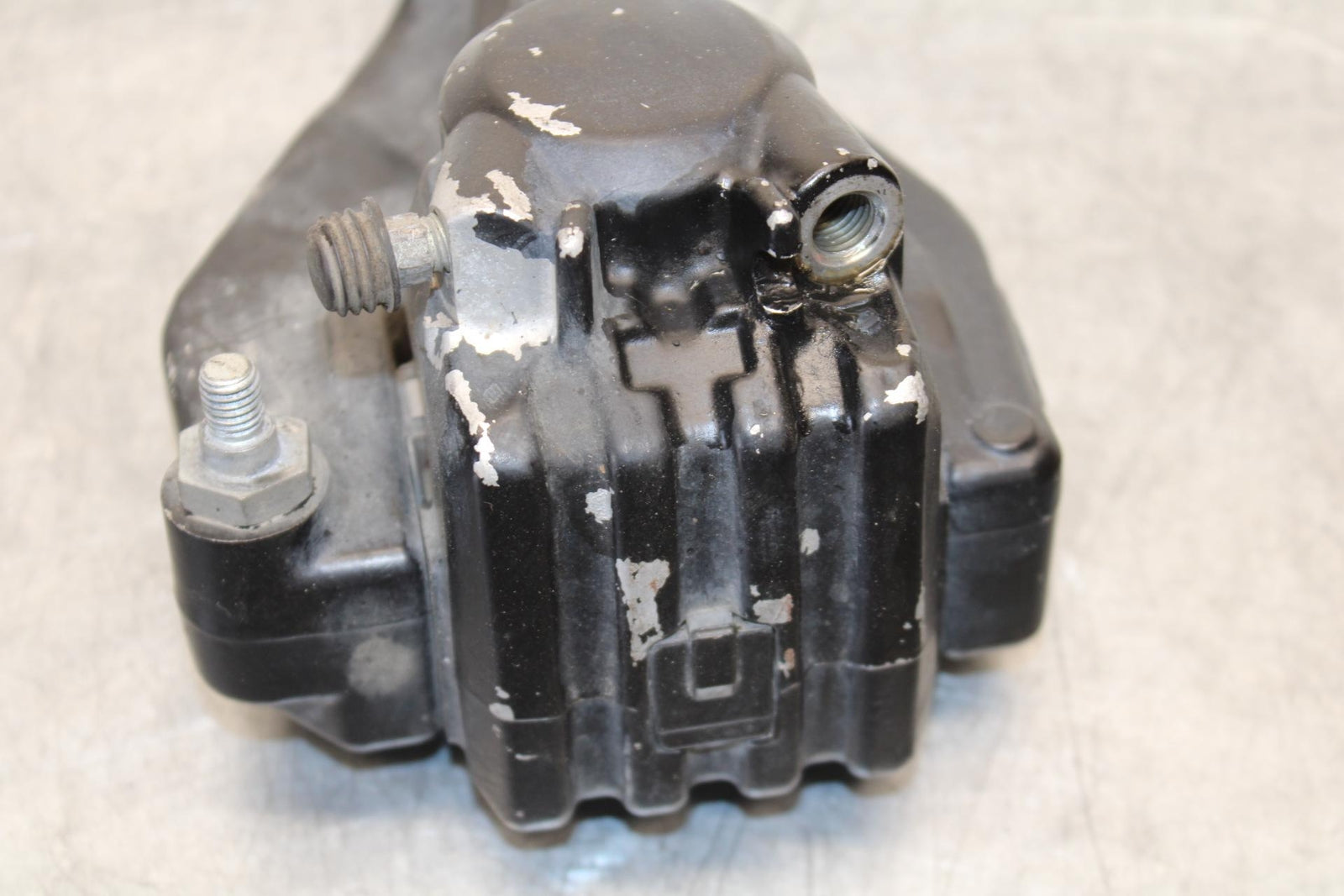 1977 Yamaha XS750 REAR BACK BRAKE CALIPER W MOUNT BRACKET BB554