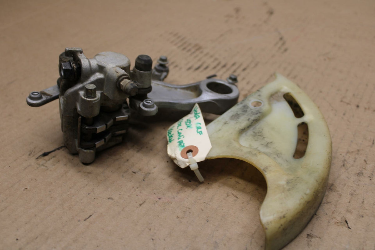 05 HONDA CRF450X REAR BACK BRAKE CALIPER BB01