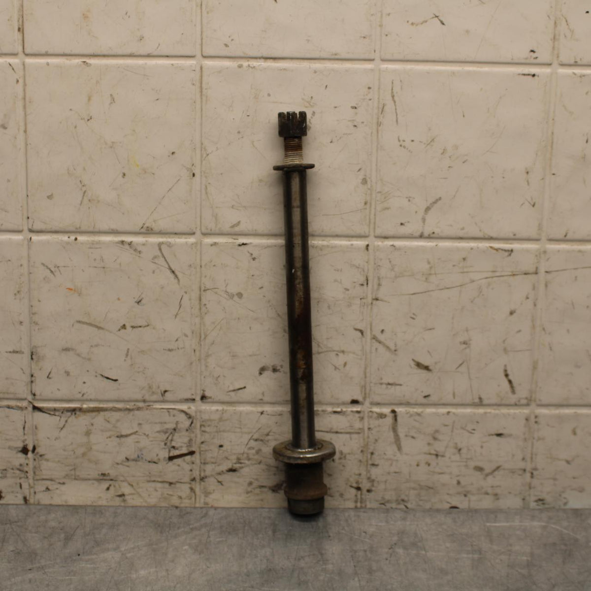 75 SUZUKI GT 550 FRONT WHEEL RIM AXLE PIVOT BOLT BB67