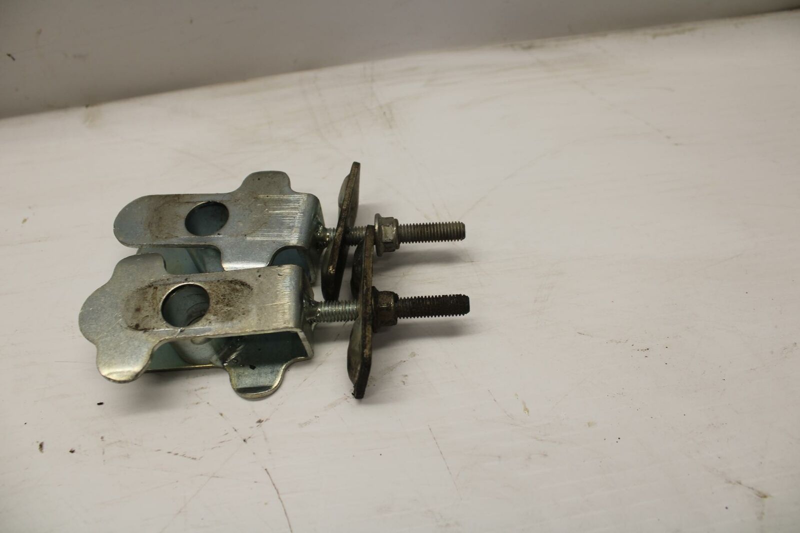 04-09 SUZUKI GS500F SWINGARM CHAIN TENSIONER ADJUSTMENT BRACKETS  BB261