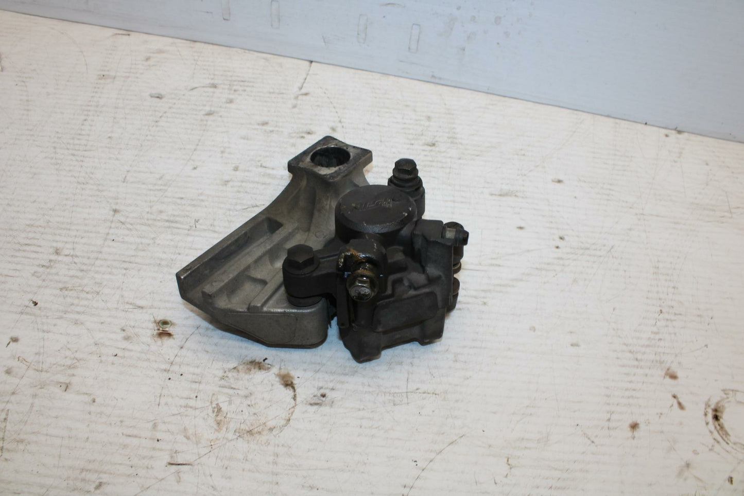 03-05 SUZUKI SV1000 REAR BACK BRAKE CALIPER W MOUNT BRACKET BB296