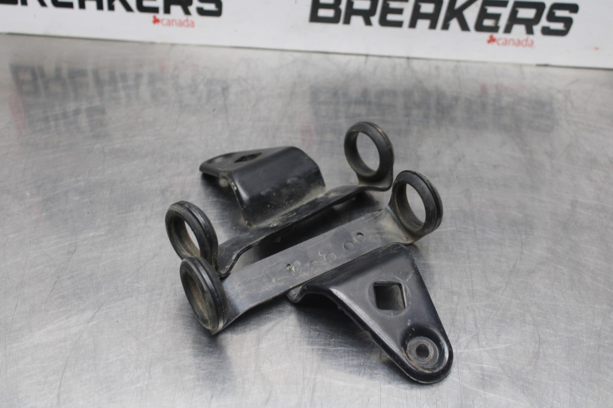 77 SUZUKI GS750 FRONT HEADLIGHT BRACKET PAIR FORK EAR BB779