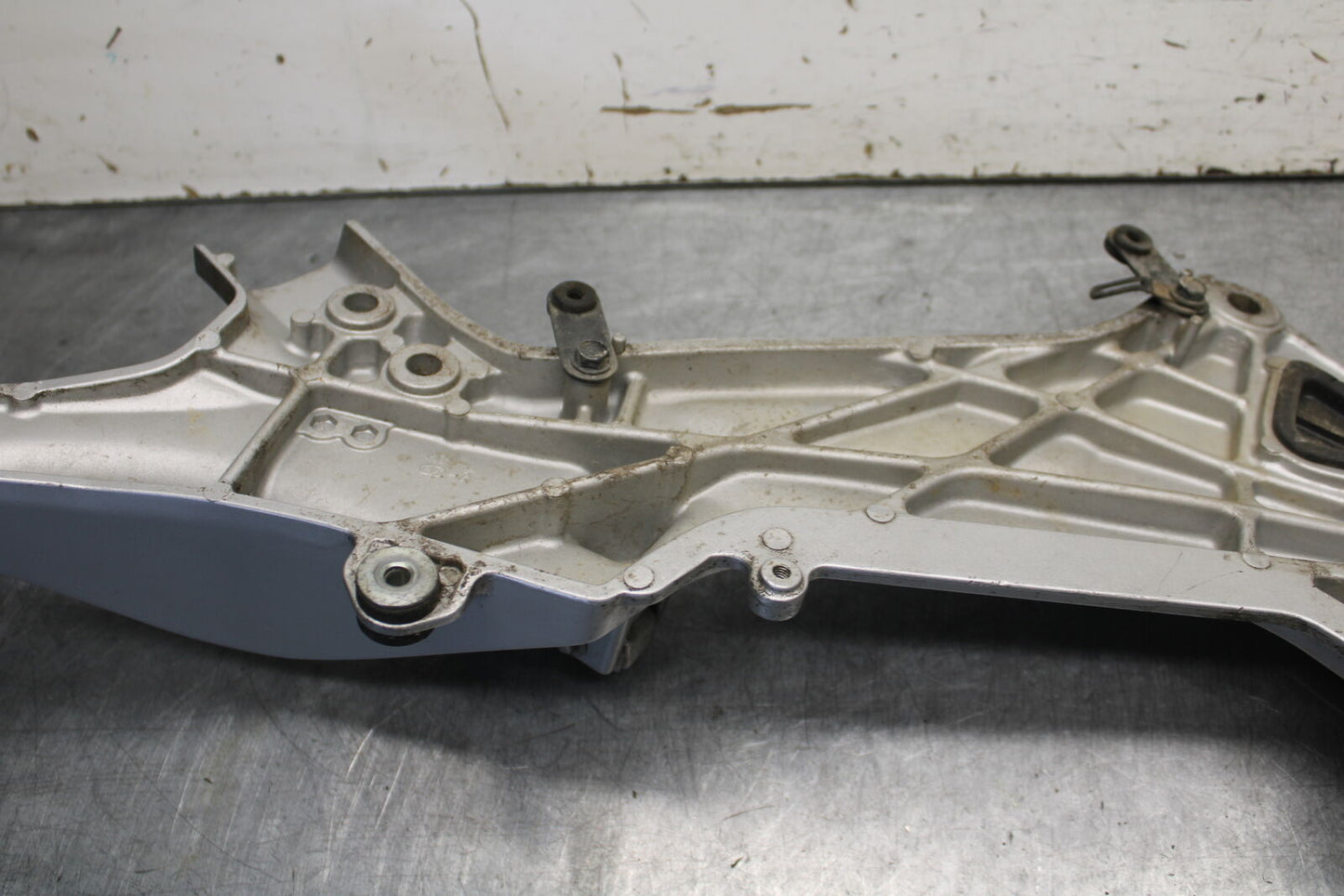 04-12 HONDA ST1300A LEFT FRONT FOOT REST PEG STEP MOUNT BRACKET BB669