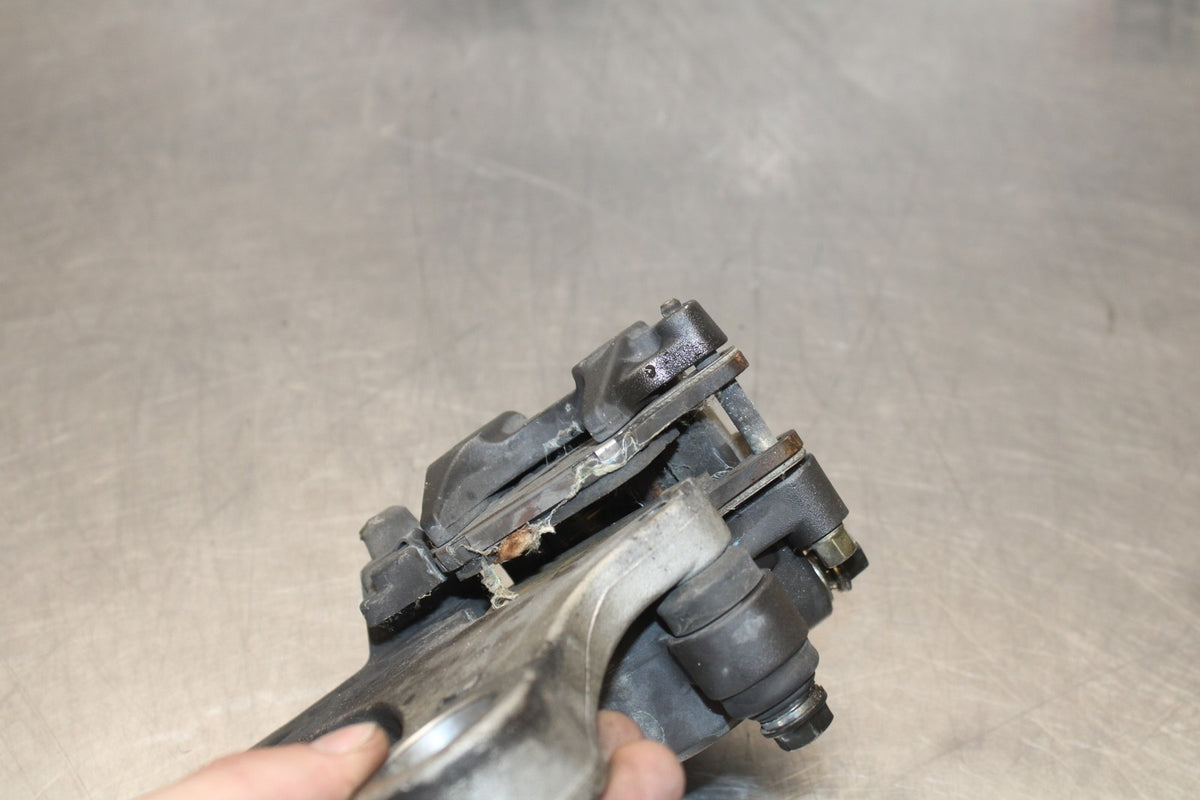 05-06 HONDA CBR600RR REAR BACK BRAKE CALIPER W MOUNT BRACKET BB893
