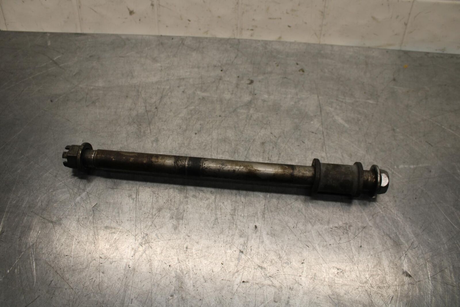 1977 Honda CB550K --- REAR AXLE BACK WHEEL PIVOT BOLT AXEL 42301-300-020 BB592