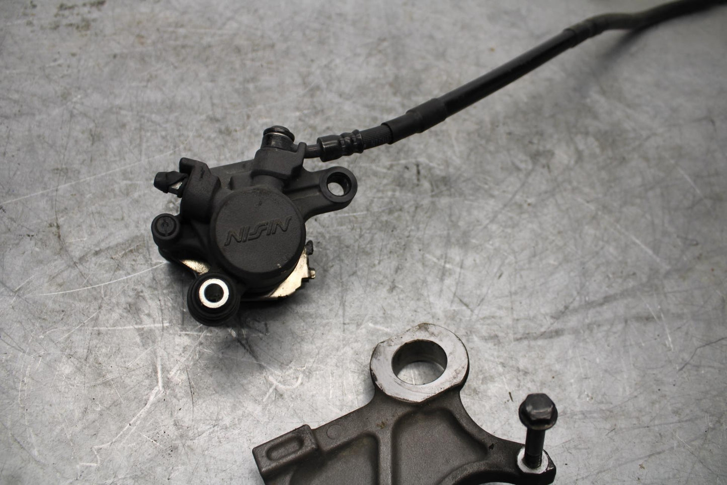 08-16 YAMAHA YZF R6 REAR BACK BRAKE CALIPER W MOUNT BRACKET BB431