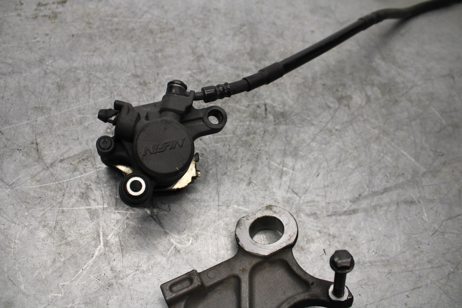 08-16 YAMAHA YZF R6 REAR BACK BRAKE CALIPER W MOUNT BRACKET BB431