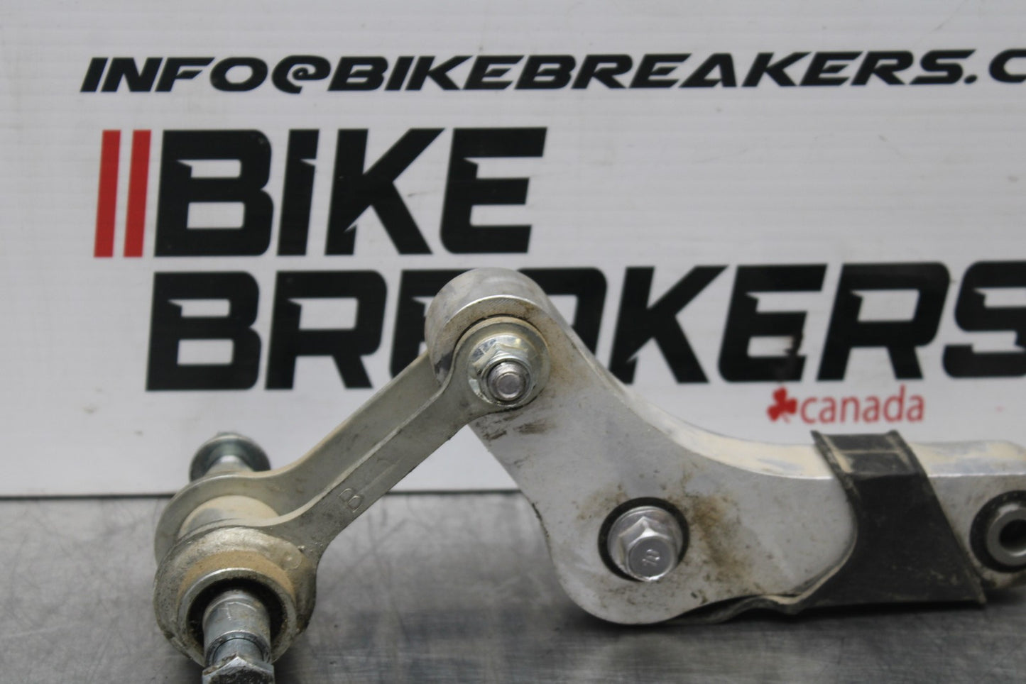 22-25 YAMAHA YZF R7 REAR DOGBONE SHOCK LINKAGE LINK 1WS-2217A-00-00 BB769
