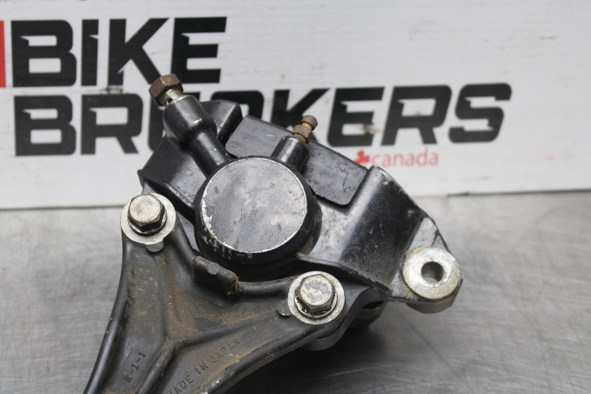 77-79 SUZUKI GS1000 REAR BACK BRAKE CALIPER W MOUNT BRACKET BB807