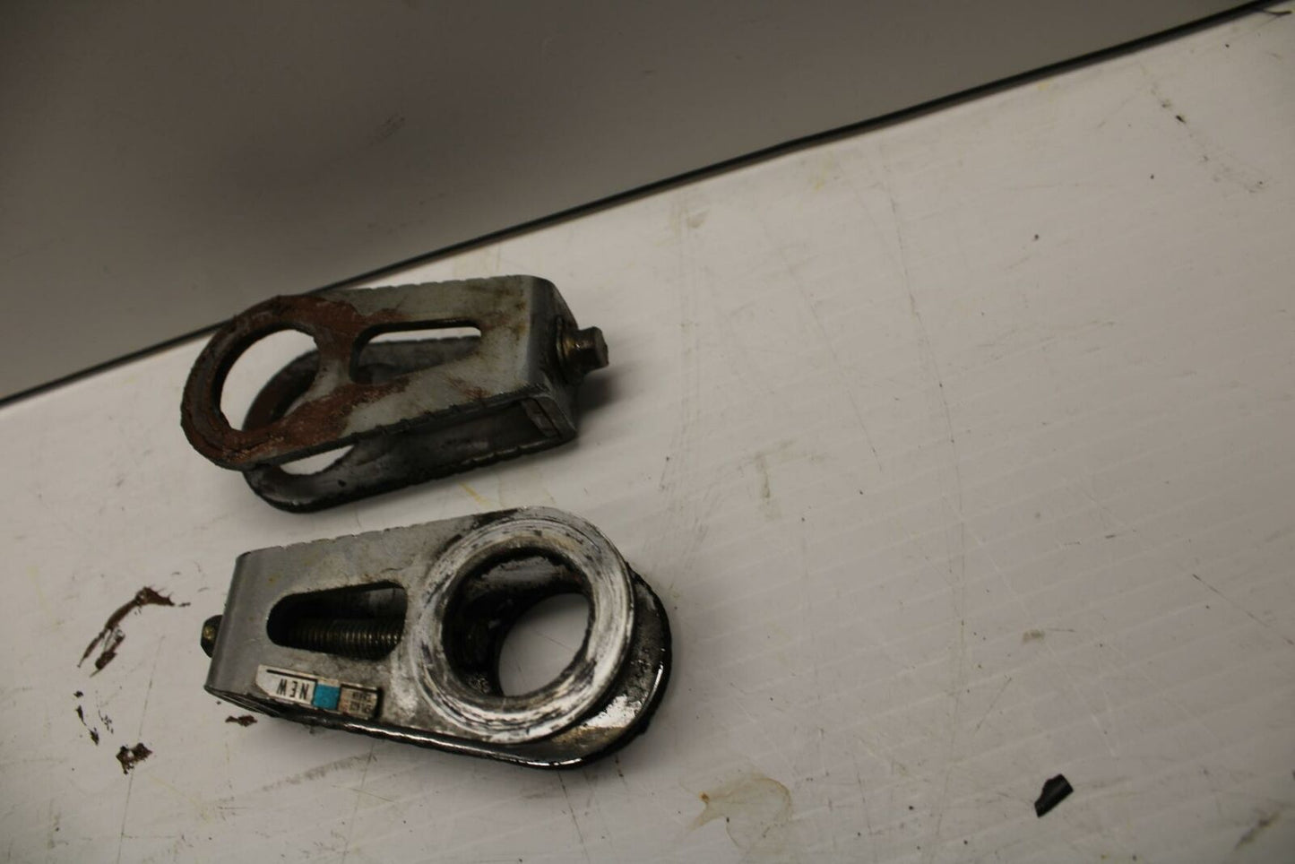 03-04 HONDA CBR600RR SWINGARM CHAIN TENSIONER ADJUSTMENT BRACKETS  BB253