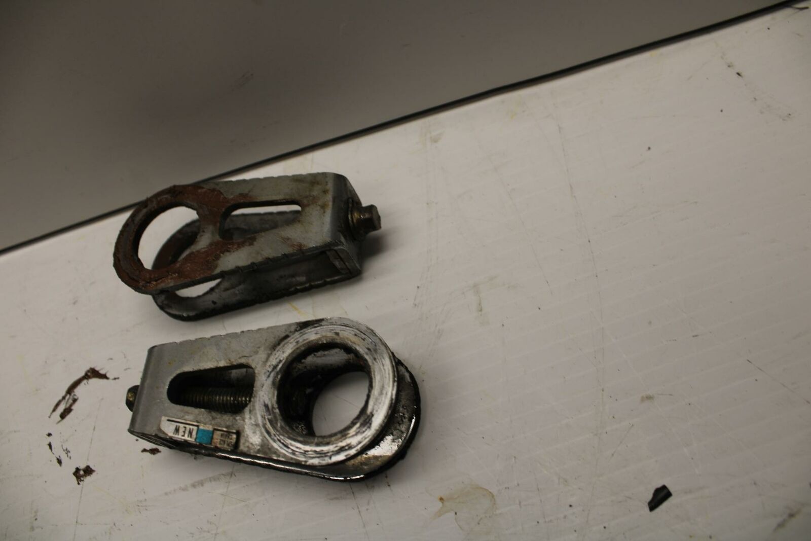 03-04 HONDA CBR600RR SWINGARM CHAIN TENSIONER ADJUSTMENT BRACKETS  BB253