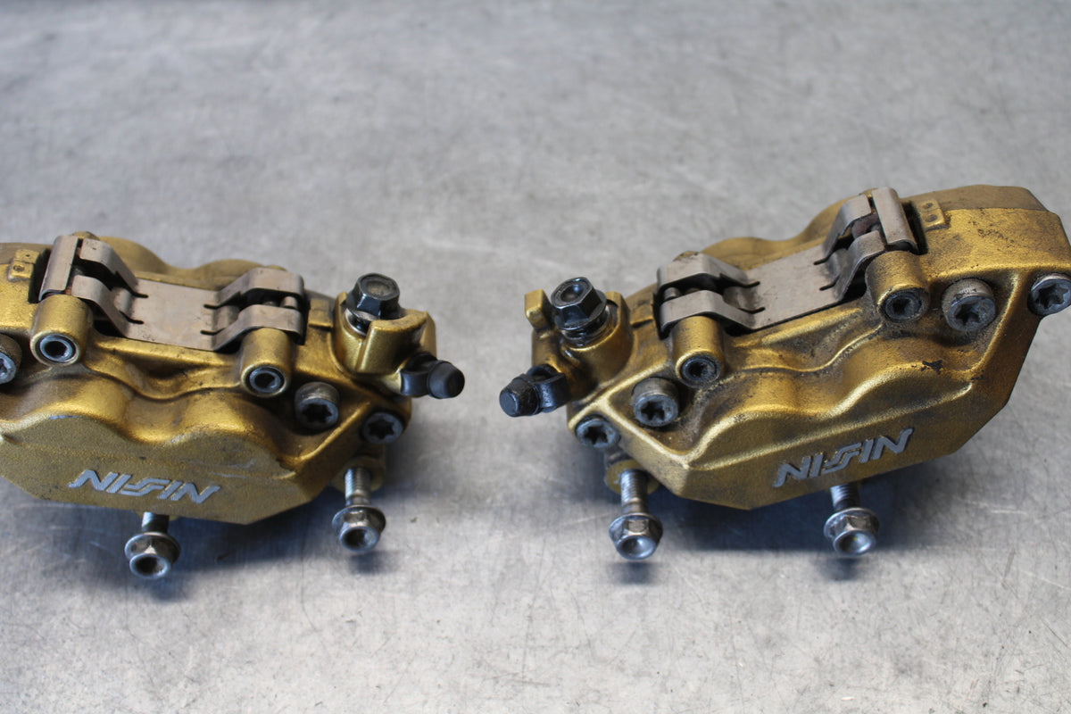03-04 HONDA CBR600RR RIGHT LEFT FRONT BRAKE CALIPER SET PAIR CALIPERS BB661