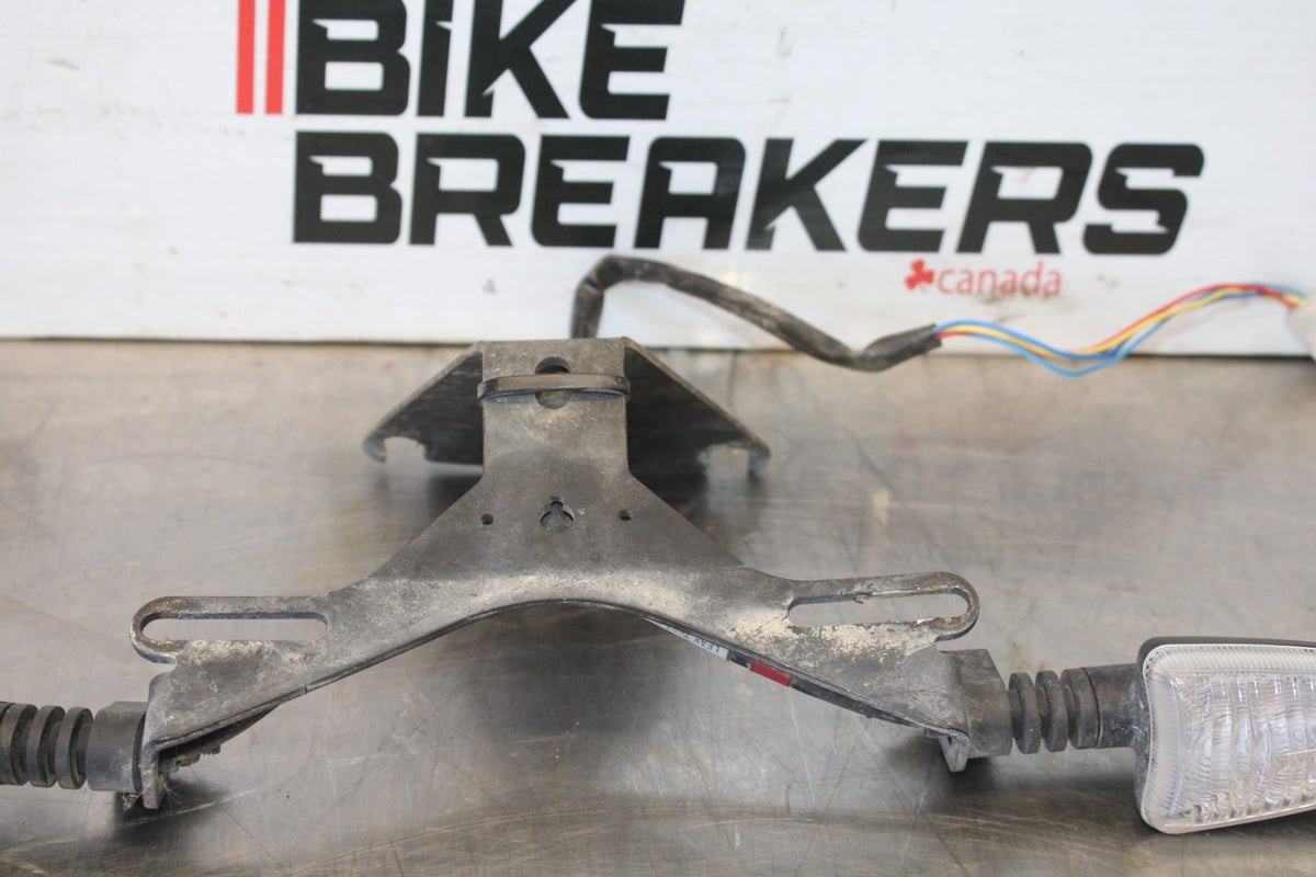 24 APRILIA TUONO V4 1100 FACTORY ABS FENDER ELIMINATOR PLATE BRACKET BB887