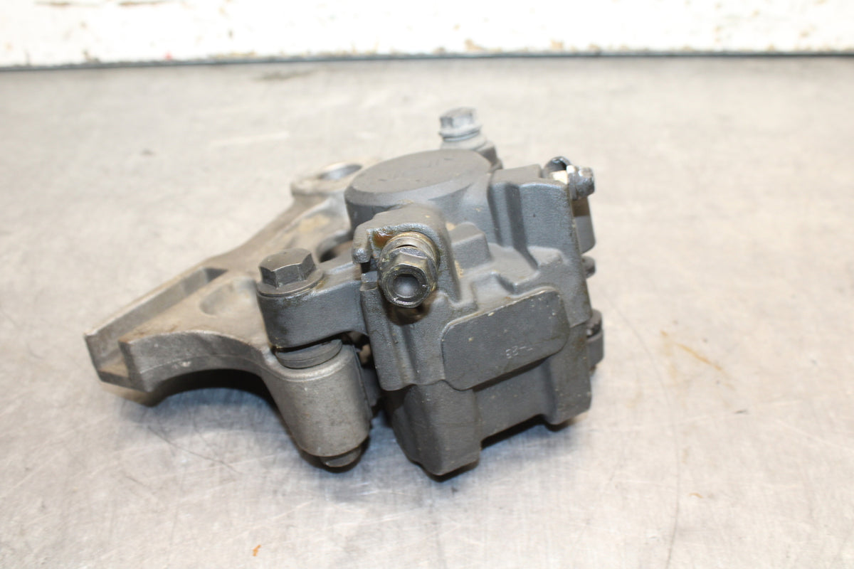 01-06 HONDA CBR600F4I REAR BACK BRAKE CALIPER W MOUNT BRACKET BB115