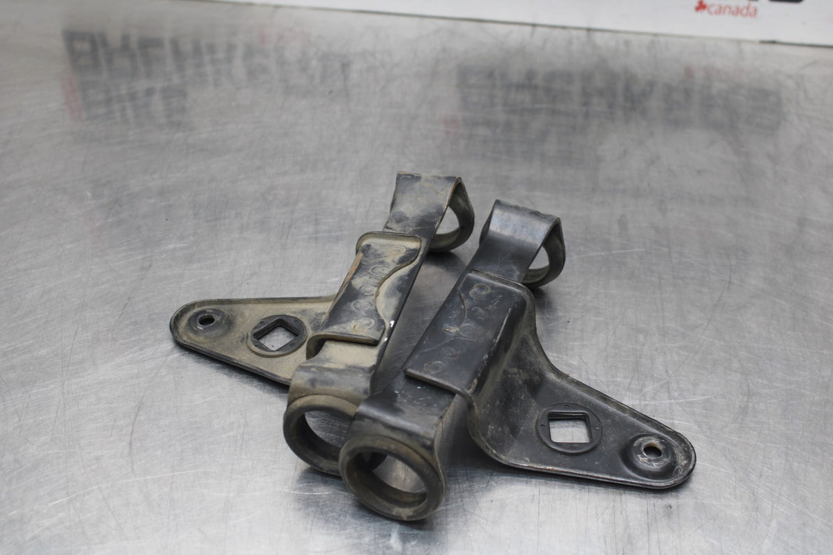 77 SUZUKI GS750 FRONT HEADLIGHT BRACKET PAIR FORK EAR BB779