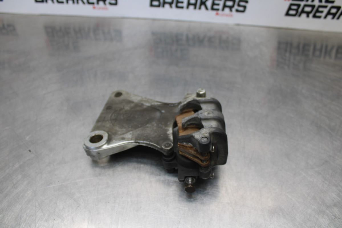 05 TRIUMPH ROCKET III REAR BACK BRAKE CALIPER W MOUNT BRACKET BB186