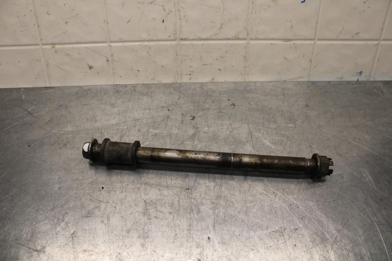 1977 Honda CB550K --- REAR AXLE BACK WHEEL PIVOT BOLT AXEL 42301-300-020 BB592
