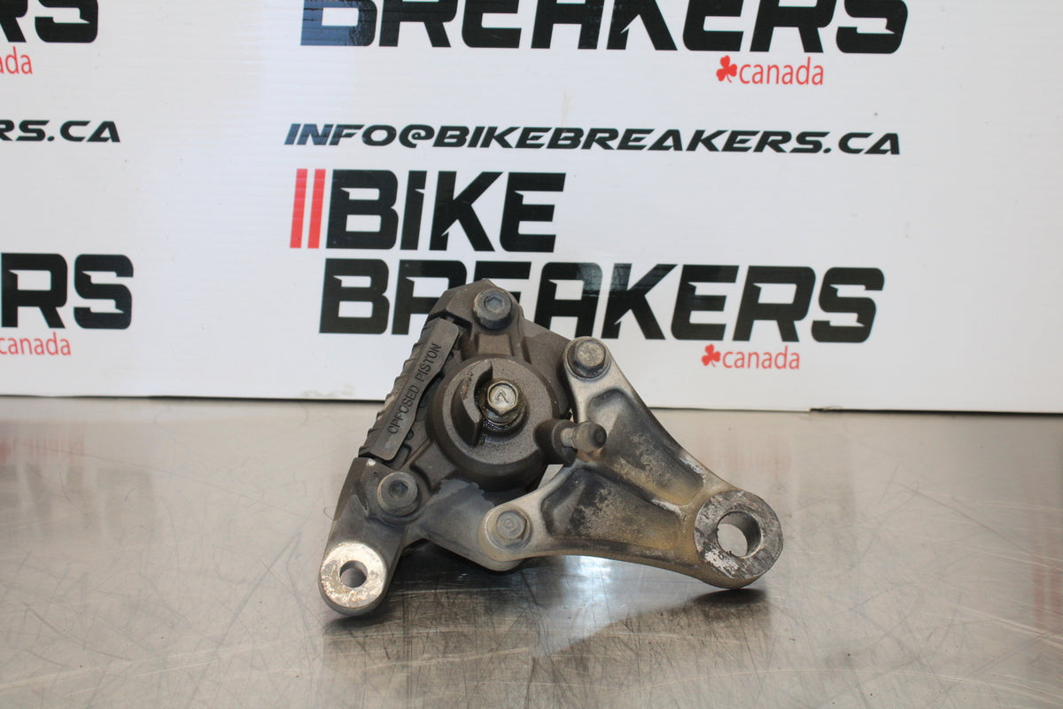 00 SUZUKI SV650 REAR BACK BRAKE CALIPER W MOUNT BRACKET BB156